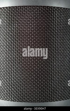 Background created with a close-up of gray speaker grille fabric. Music sound concept. Stock Photo
