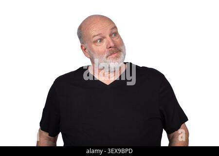 Bald Bearded Man Looking Sideways with Skeptical Amused Expression Isolated on White Background Stock Photo