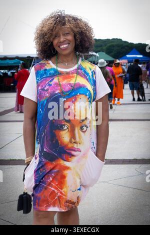 An attractive woman with great hair & wearing a t-Shirt Dress. At the 2026 African American Cultural Festival in Valhalla, Westchester, New York. Stock Photo