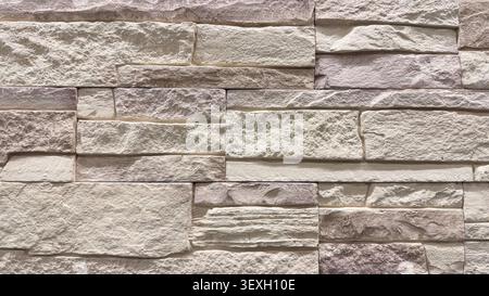 Light stone wall texture close up Stock Photo
