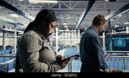 Data center colleagues use AI tools to help customers resolve website hosting problems and service interruptions. Stock Photo