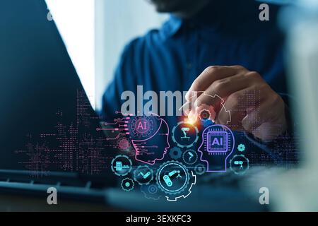 Close-up of a professional using a stylus beside a laptop with glowing AI interface icons, illustrating artificial intelligence, automation, digital t Stock Photo
