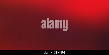 Red gradient providing an abstract textured background. Blending from vibrant red into deep dark tones, creating grunge atmosphere Stock Photo