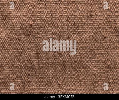 Close-up texture of woven brown fabric canvas material background Stock Photo