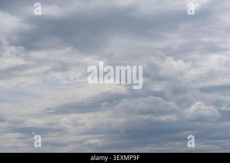 Textured overcast sky with dramatic storm clouds before rainfall creating a natural weather background Stock Photo