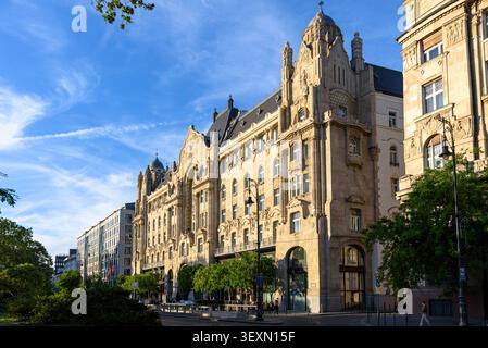 The facade of the art nouveau Gresham Palace Four Seasons hotel in Budapest, Hungary at golden hour Stock Photo
