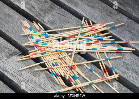 Sticks for the Mikado board game. Wooden sticks. Board game. Colored sticks. Stock Photo