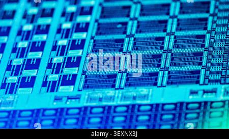 Silicon wafer displaying intricate microchip circuits and advanced technology components Stock Photo