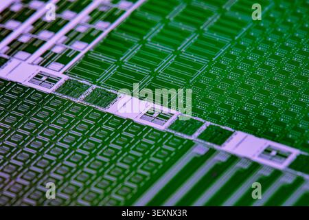 Silicon wafer surface with microchip patterns representing advanced semiconductor technology Stock Photo