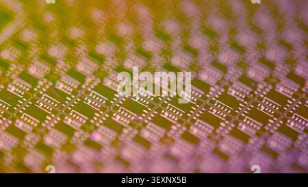 Wafer's surface showing circuitry patterns creating electronic chips Stock Photo
