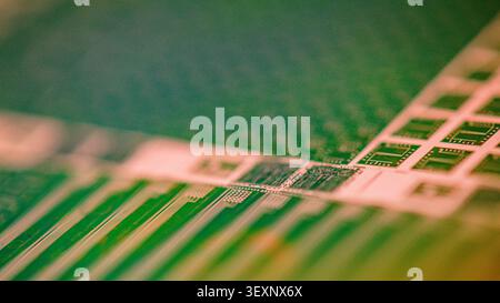 Wafer showing microchips and electronic circuits essential for technology Stock Photo