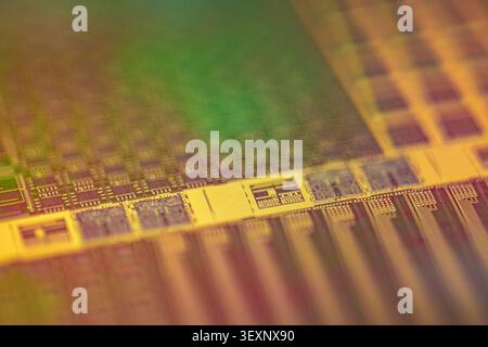 Silicon wafer with intricate microchip patterns representing advanced semiconductor technology Stock Photo