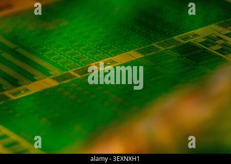 Integrated circuits on a silicon semiconductor wafer in manufacturing Stock Photo