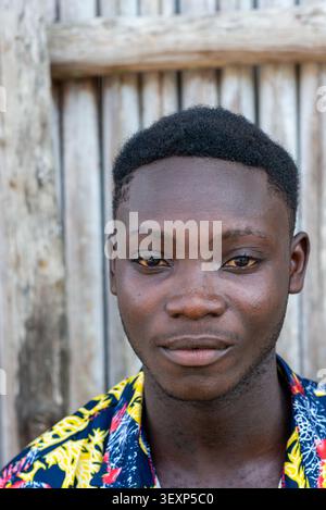 Close-up portrait of a young man, Nzulezu, Ghana Stock Photo