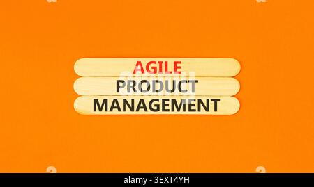 Agile product management words symbol. Concept words Agile product management on beautiful wooden sticks. Beautiful orange background. Business agile Stock Photo
