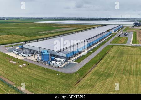 Middenmeer, Netherlands - June 15, 2026: Digital infrastructure and cloud computing technology, large data center building for internet and network co Stock Photo
