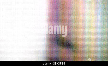 Close-up macro view of colored RGB pixels forming a digital screen display Stock Photo