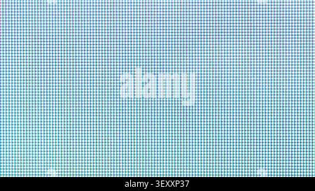 Screen displaying a close-up blue pixel grid pattern Stock Photo