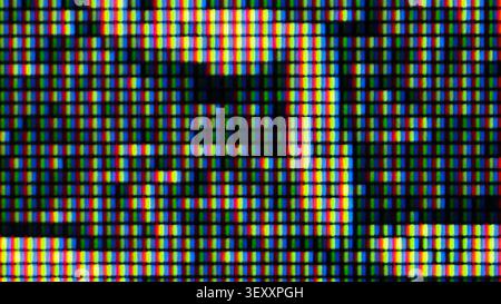 Macro view of an LED screen displaying a digital data pattern with individual red, green, and blue subpixels Stock Photo