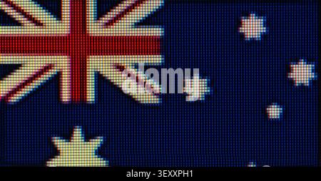 Australian flag showing close-up on a digital display with visible red, white, and blue pixel grid Stock Photo