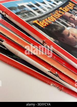 Stack of 1980 and 81 Time magazines in poor condition with rusted staples and tears, United States Stock Photo