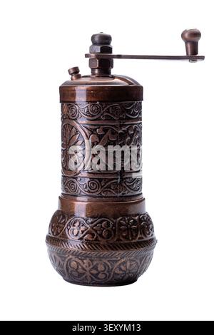 Traditional oriental copper pepper grinder isolated on white background Stock Photo