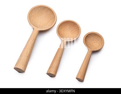 Set of three wooden measuring spoons of different sizes isolated on white background Stock Photo