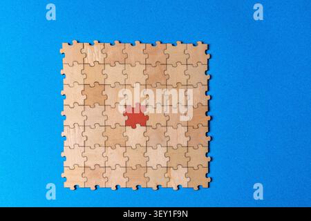 Forming a team solution with diverse puzzle pieces Stock Photo
