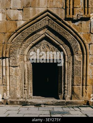 Intricately carved stone doorway of Ananuri church in Georgia. Stock Photo