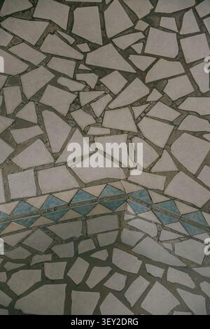 Abstract mosaic stone floor texture with geometric tile patterns. Stock Photo