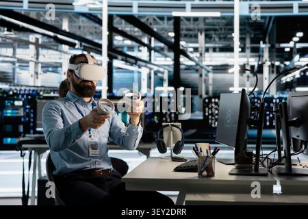 Data center technician uses a VR headset to inspect AI neural networks and server systems in a high-tech facility. Stock Photo