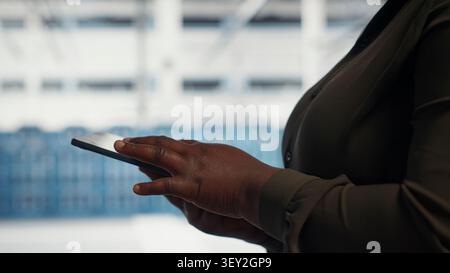 IT colleagues collaborate in a data center while reviewing AI diagnostics and infrastructure performance. Stock Photo