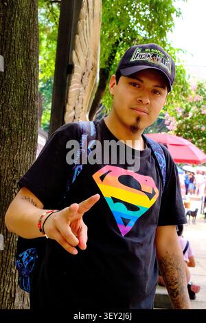 Mexico City, CDMX, Mexico – June 27, 2026: Pride Participant Wearing Rainbow Superman Shirt Stock Photo
