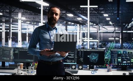 High tech server room team supervisor presents AI technology to shareholders, demonstrating predictive maintenance capabilities. Stock Photo