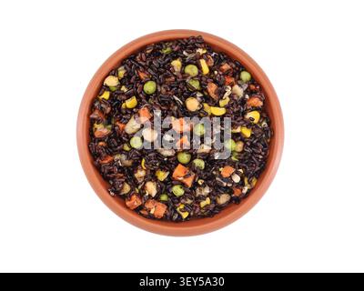 Dish of black rice with vegetables on white background. Top view. Stock Photo