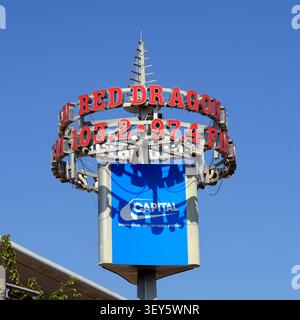 Cardiff Bay-Red Dragon Radio sign against blue sky Stock Photo