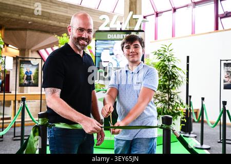 Leuven, Belgium. 02nd July, 2026. ATTENTION EDITORS: FOCUS COVERAGE, DISTRIBUTION REQUESTED TO BELGA - EDITORIAL USE ONLY - Two diabetes patients cut a ribbon at the launch of the "24-7 Diabetes" campaign by Diabetes Liga, the Diabetes Association, and Dexcom, aimed at raising public awareness and addressing the lack of knowledge about diabetes, at UZ Leuven Gasthuisberg Campus, on Thursday 02 July 2026, in Leuven. BELGA PHOTO TOM GOYVAERTS Credit: Belga News Agency/Ģ����ý Live News Stock Photo