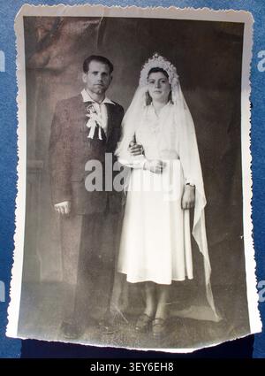 Vintage Black and White Wedding Portrait of Newlywed Couple. Old family photo circa 1950 Stock Photo