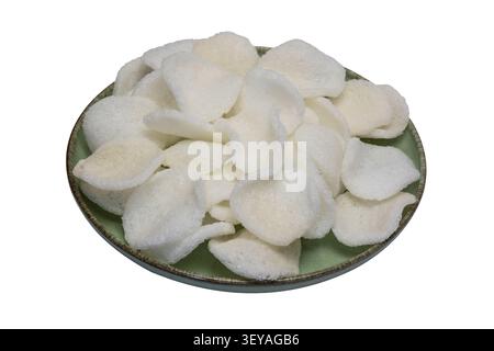 Chinese prawn crackers isolated, on white background, in plate, Asian snack, crunchy seafood appetizer Stock Photo