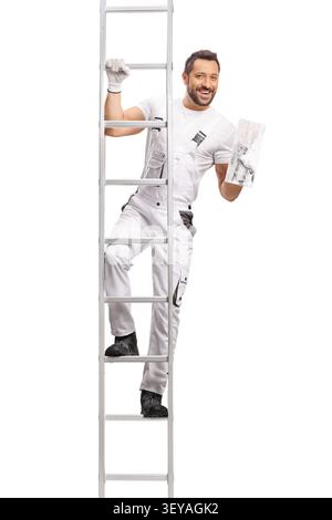 Plasterer climbing a ladder and holding a throwel isolated on white background Stock Photo