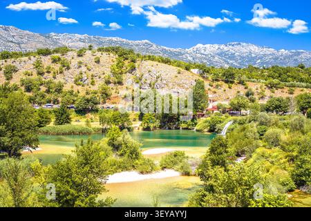 Zrmanja river beach waterfalls and nature view. River under Velebit mountain in Croatia Stock Photo