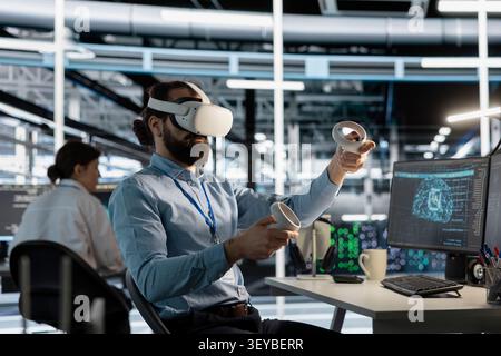 System administrator uses a VR headset to inspect AI neural networks and server systems in a high-tech facility. Stock Photo