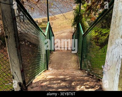 High angle view of the pedestrian bridge stairs at the Provincial Station in Meridiano V neighborhood in City of La Plata Buenos Aires Argentina. Stock Photo