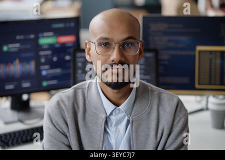 Portrait of Adult Man Working in Information Technology Office Stock Photo