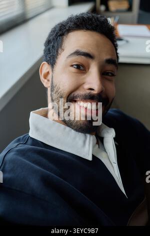 Portrait of Adult Man Smiling in Information Technology Office Stock Photo