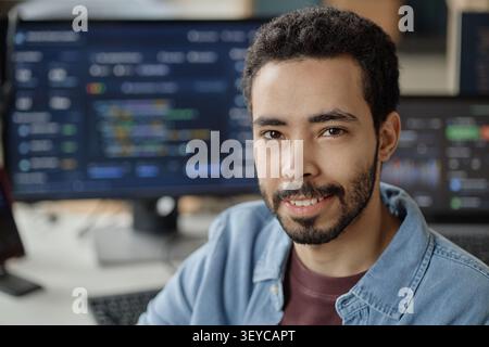 Portrait of Man Working in Information Technology Office Stock Photo