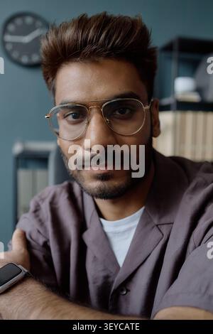 Portrait of Adult Indian Man Posing in Information Technology Office Stock Photo