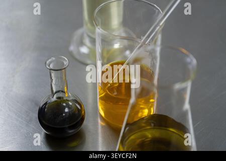 Laboratory Glassware and Pipette During Analytical Testing Stock Photo