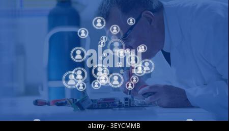 Senior tech repairing PCB in lab, motion sparking animated icons clustering near hands Stock Photo