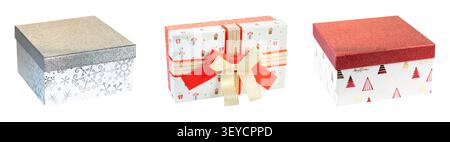 Three Christmas gift boxes row isolated on clean white background holiday shopping retail template Stock Photo